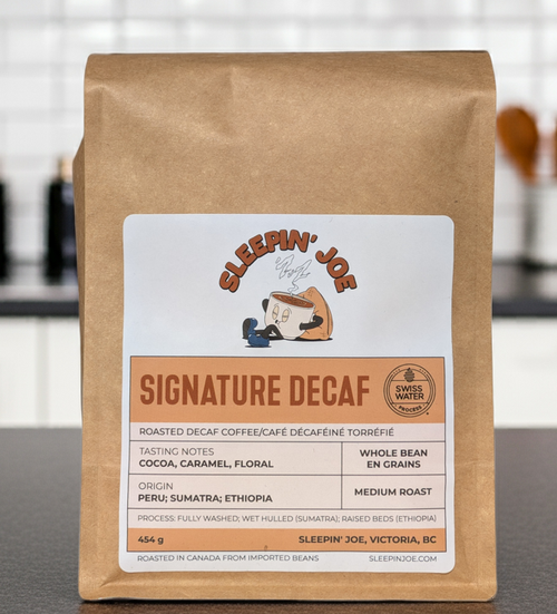 Sleepin' Joe Signature Decaf coffee package on a kitchen counter
